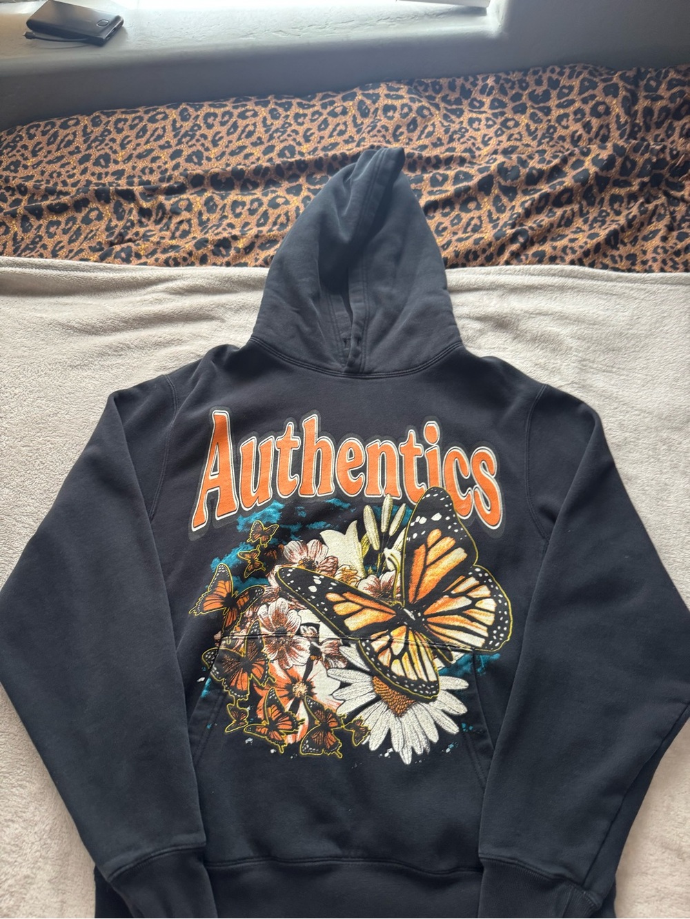 Authentics Black Hoodie with Orange Butterfly Graphic